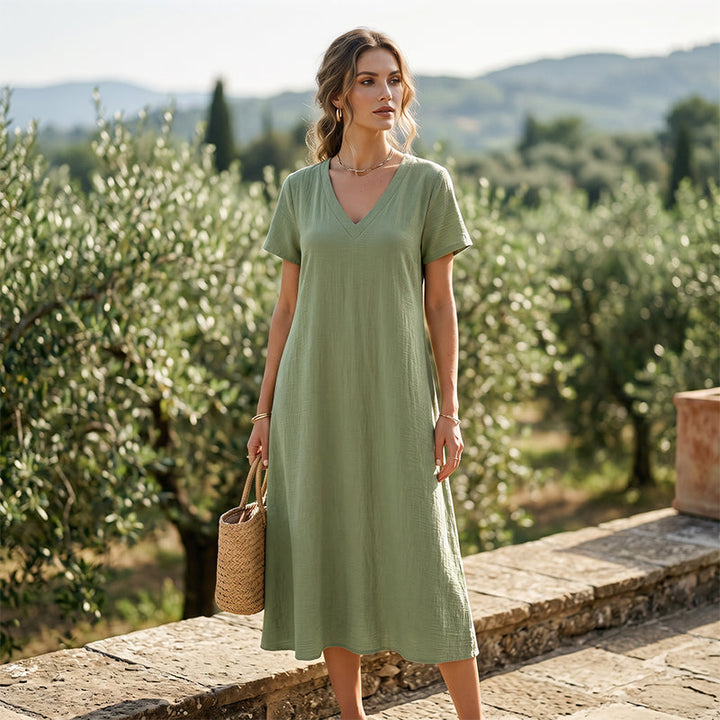 Abito casual donna maxi, scollo a V e tasche. Vestito estivo versatile e confortevole per look alla moda.