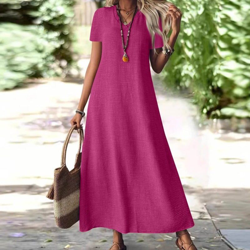Tessuto leggero di abito maxi donna, vestito estivo scollo a V e tasche per comfort e stile. Perfetto per il caldo.