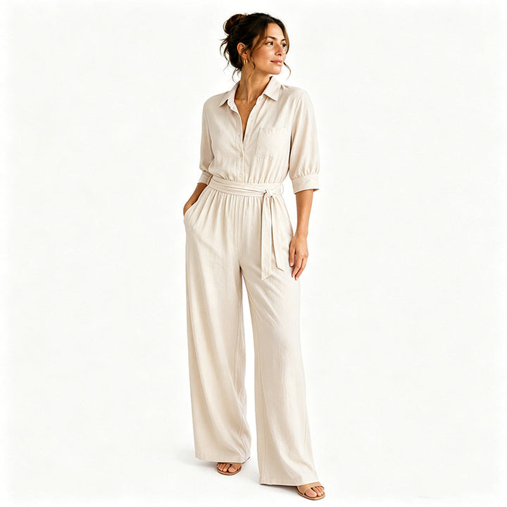 Tuta elegante donna con pantaloni larghi e cintura fluttuante, ideale per look casual chic.