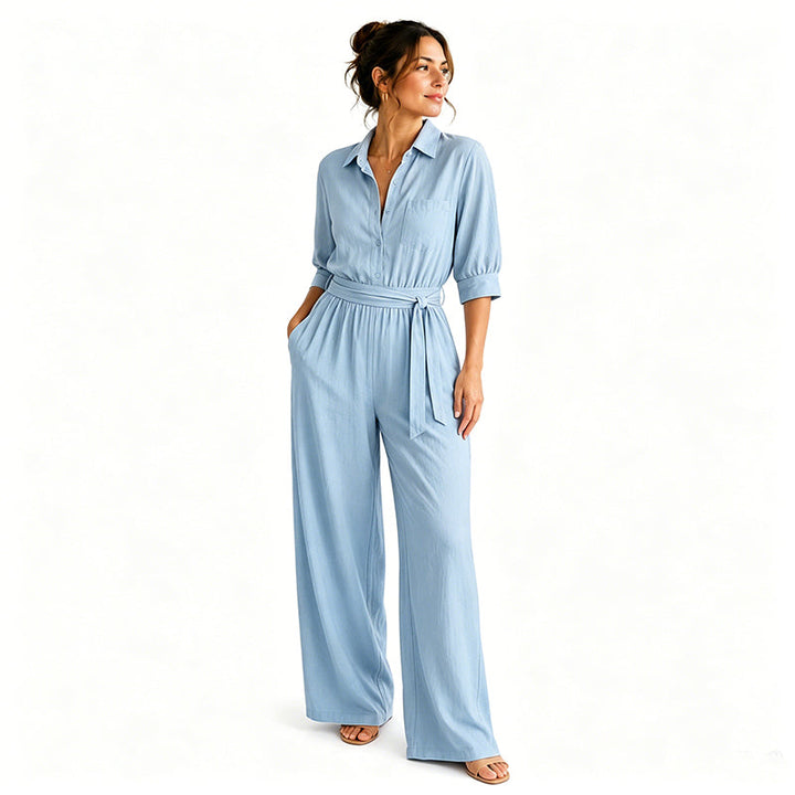 Moda italiana: tuta donna elegante con pantaloni larghi e cintura. Outfit estivo versatile e chic.