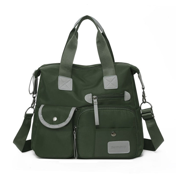 Borsa donna grande e resistente, impermeabile, con tasche per laptop e documenti, ideale per lavoro.