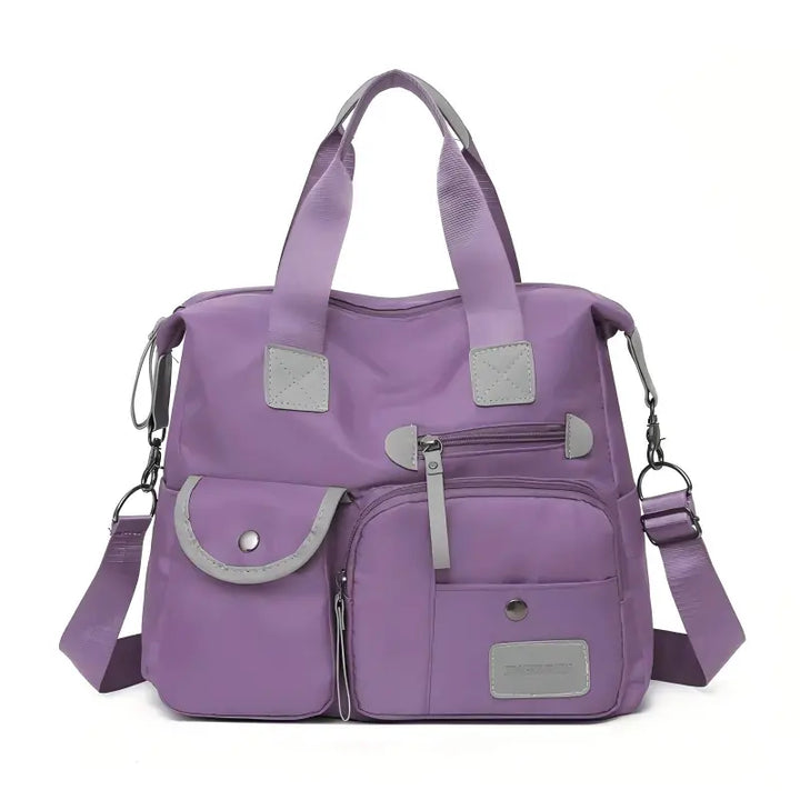 Borsa grande impermeabile da donna, con tasche sicure per oggetti personali e design resistente e pratico.