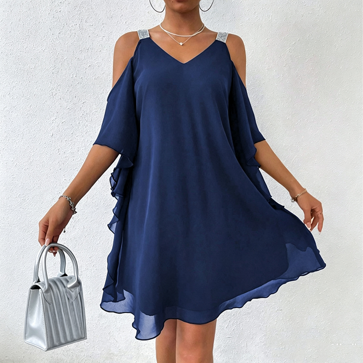 Abito statement donna elegante, spalle scoperte e spalline brillanti. Vestito estivo multicolore, un must-have chic.