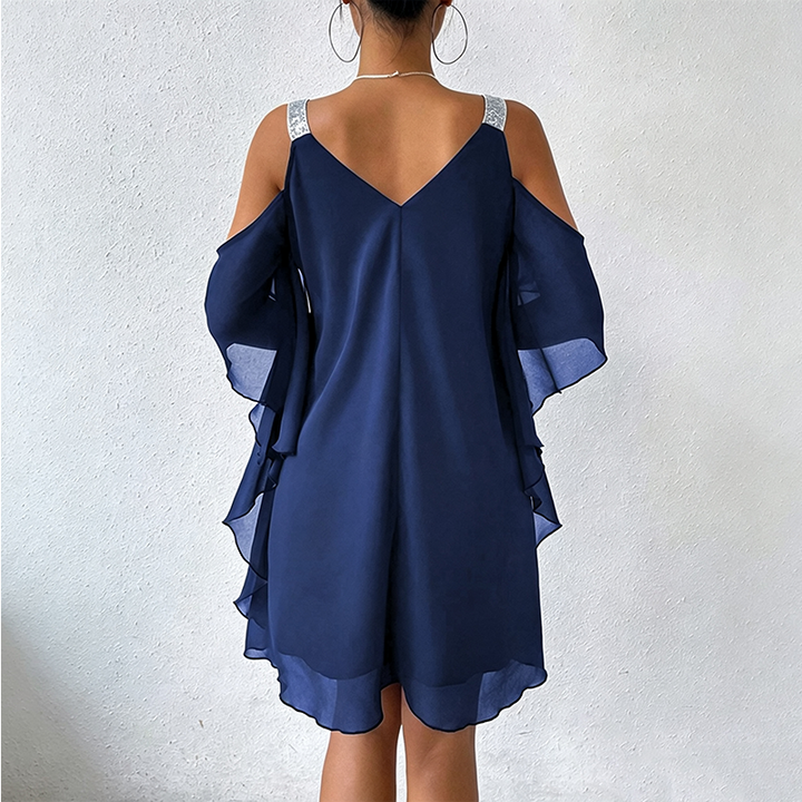 Abito versatile donna, spalle scoperte. Vestito elegante casual chic con spalline brillanti, stampa multicolore.
