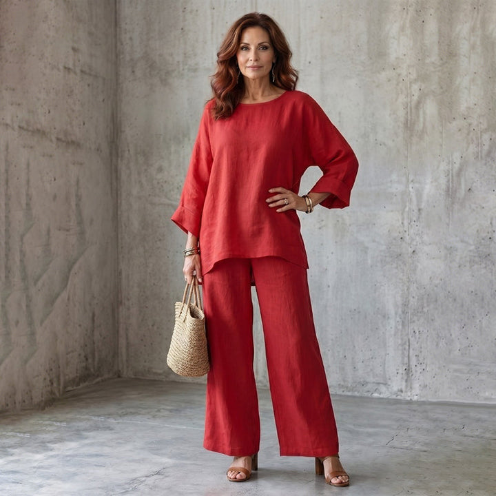 Set elegante donna: blusa e pantaloni larghi, perfetto per le giornate primaverili ed estive con stile.