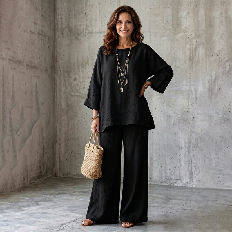 Abbigliamento donna: completo elegante primavera/estate con blusa e pantaloni larghi per ogni occasione.