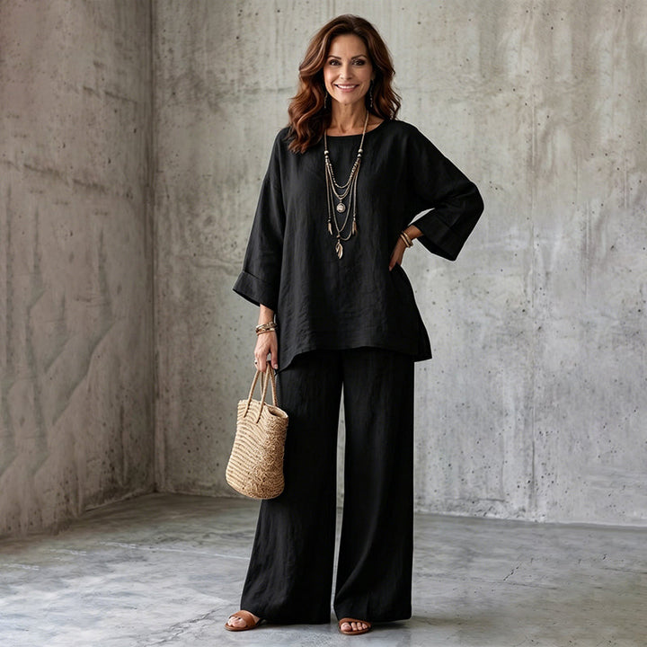 Abbigliamento donna: completo elegante primavera/estate con blusa e pantaloni larghi per ogni occasione.