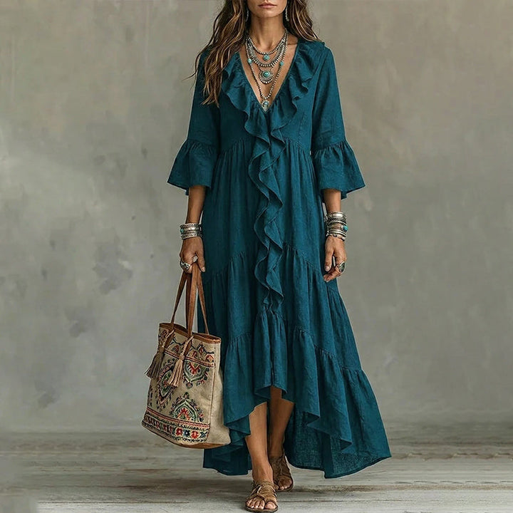 Abito midi bohemien da donna con scollo a V e volant, perfetto per look casual chic primavera estate.