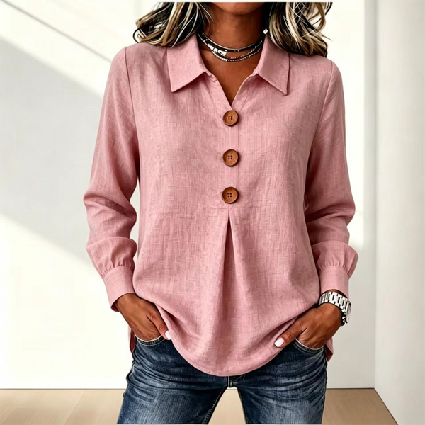 Blusa donna con bottoni decorativi e maniche lunghe, ideale per uno stile elegante e confortevole.