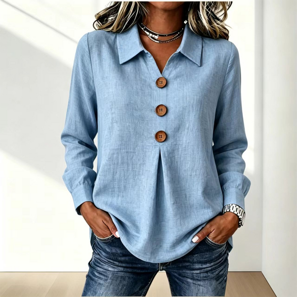 Camicia donna elegante, con colletto classico e bottoni, perfetta per look da ufficio o casual chic.