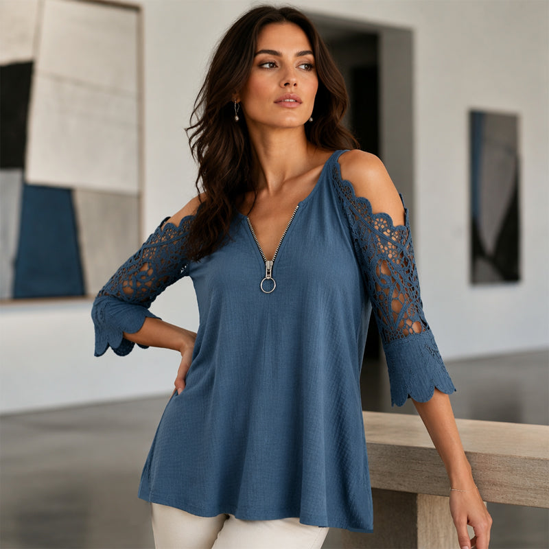 Blusa donna estiva con spalle scoperte, dettagli in pizzo e zip. Eleganza e comfort per la primavera.