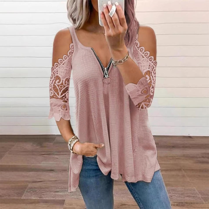 Top donna spalle scoperte con pizzo e zip, perfetto per un look estivo elegante e moderno.