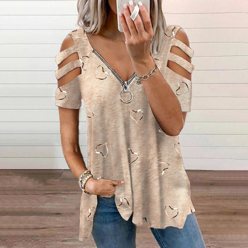 T-shirt donna comoda e trendy, con spalle scoperte, zip ornamentale e graziosi cuori. Ideale per la moda estiva.