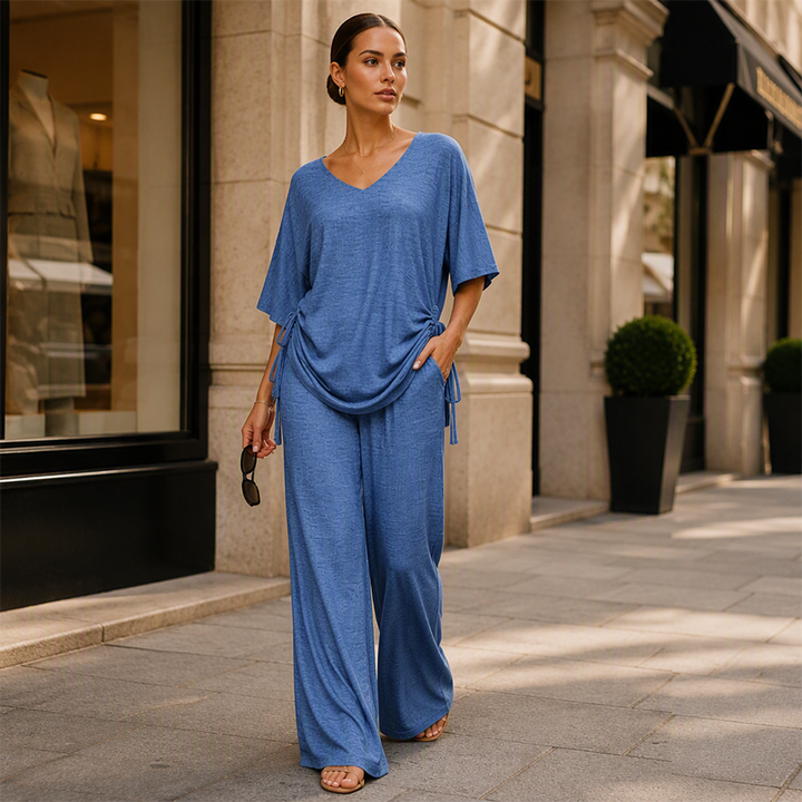 Top regolabile e pantaloni larghi fluidi compongono questo completo donna due pezzi per un comfort estivo.