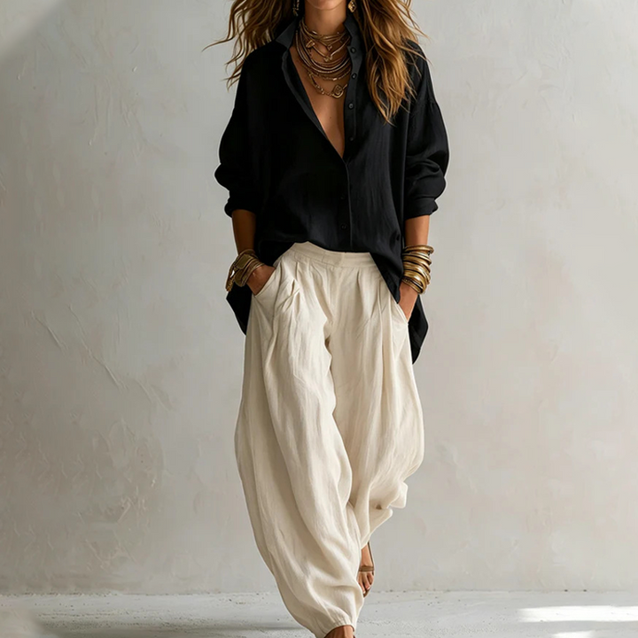 Abbigliamento donna: completo casual elegante con camicia ampia e pantaloni fluidi. Massimo comfort e stile.