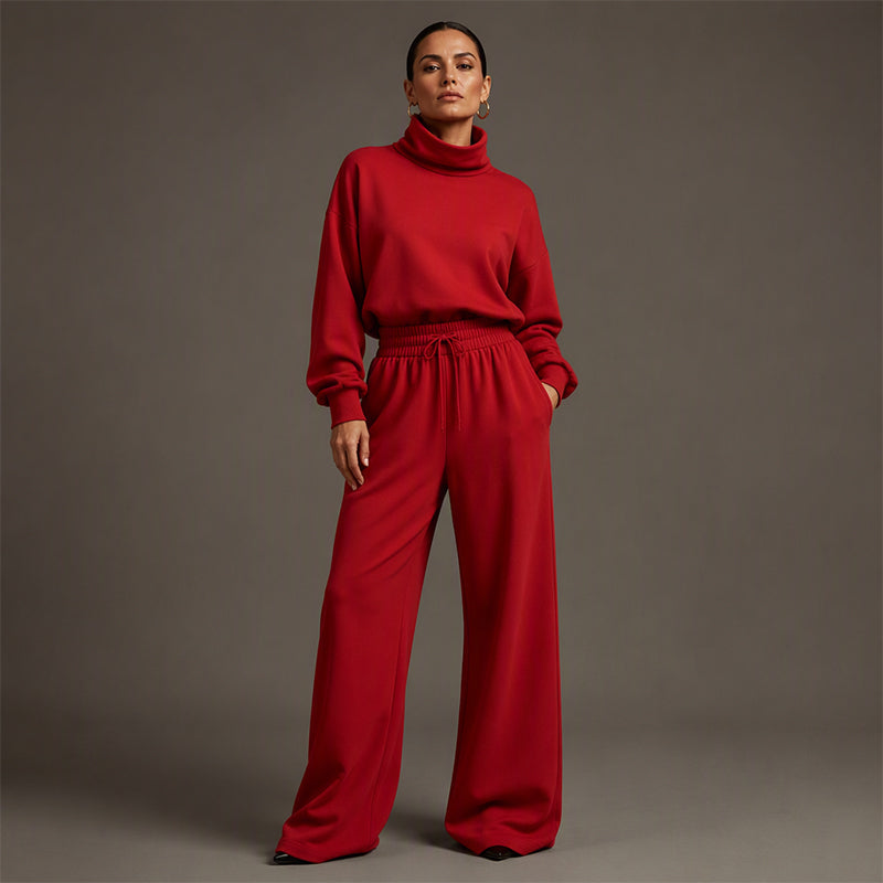 Completo donna trendy: top collo alto e pantaloni ampi che slanciano, per outfit alla moda e confortevole.