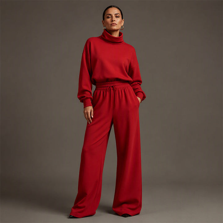 Completo donna trendy: top collo alto e pantaloni ampi che slanciano, per outfit alla moda e confortevole.