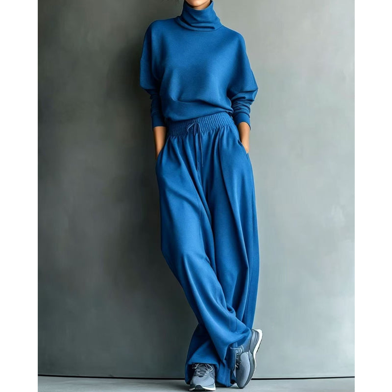 Set donna casual elegante in tessuto morbido, con collo alto e pantaloni larghi, ottimo per il quotidiano.