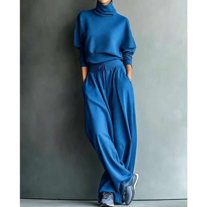 Set donna casual elegante in tessuto morbido, con collo alto e pantaloni larghi, ottimo per il quotidiano.