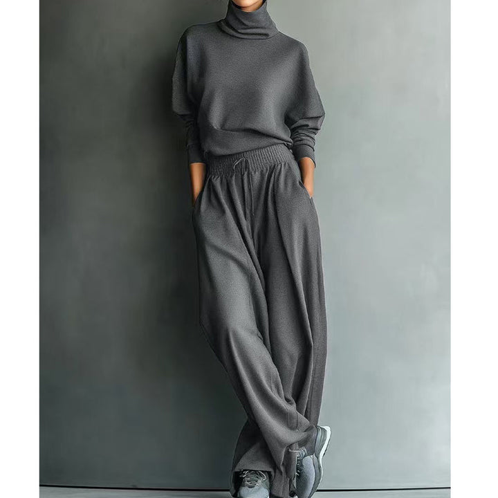 Completo donna elegante due pezzi collo alto e pantaloni larghi per un look sofisticato.