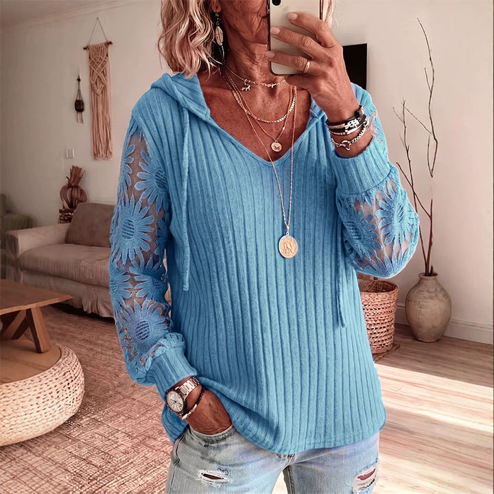 Top primaverile-autunnale da donna con pizzo floreale sulle maniche e cappuccio, per un'eleganza casual.