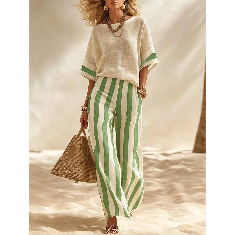Completo donna leggero, pantaloni a righe ampi per look estivo e confortevole.