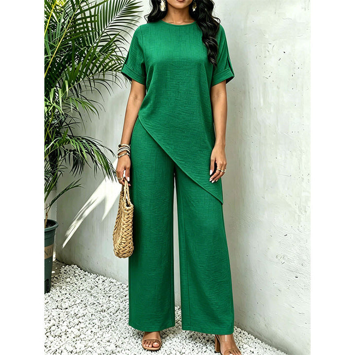 Abbigliamento donna: completo due pezzi con top asimmetrico di tendenza e pantaloni larghi per comfort estivo.