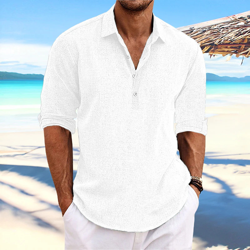 Look uomo: polo elegante con maniche arrotolabili, ideale per uno stile casual chic in primavera/estate.