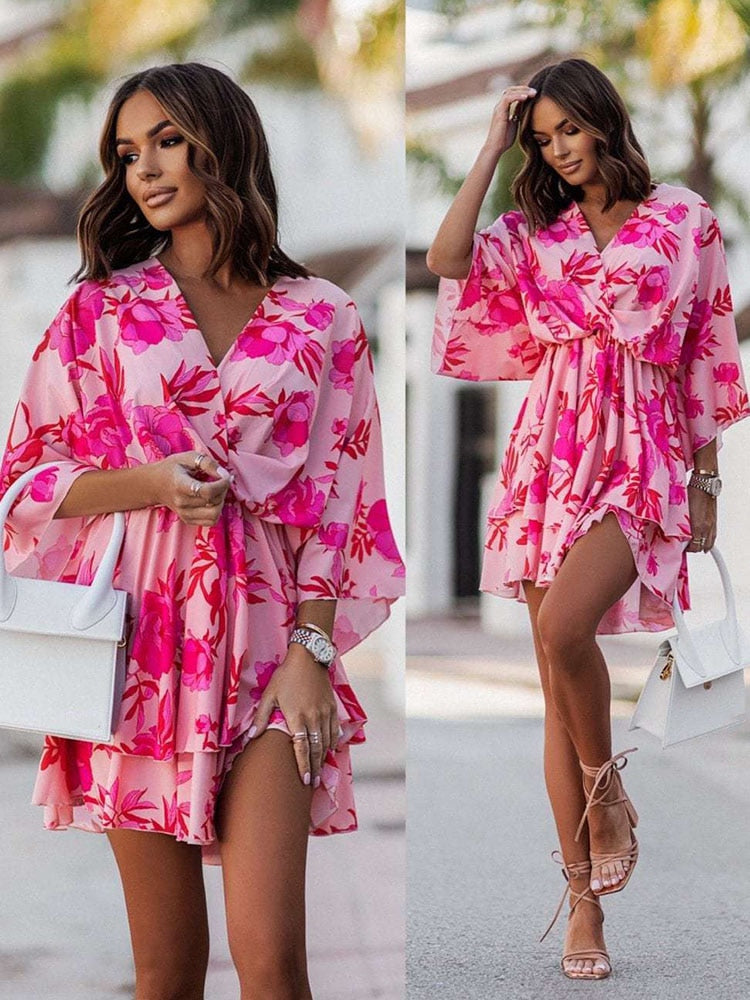Moda estiva: abito fluido scollo a V per donna, comodo e casual, disponibile in taglie grandi.
