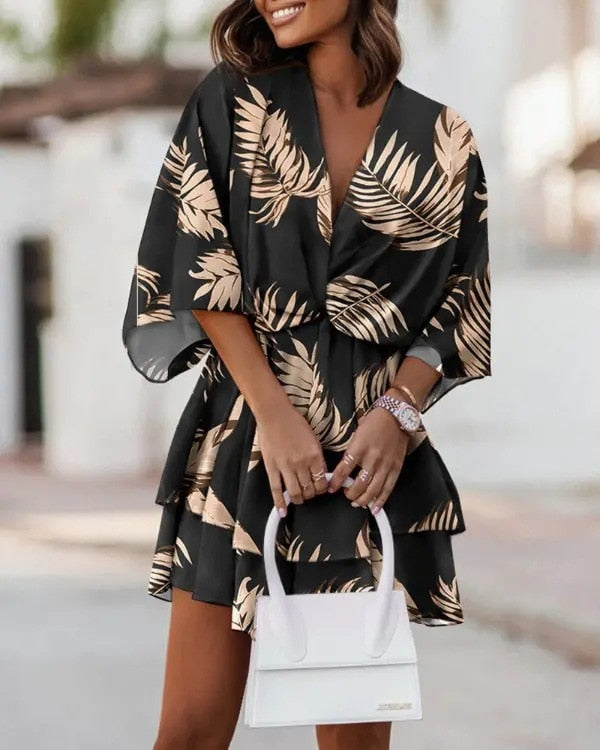 Scollo a V e linea fluida: abito estivo donna, perfetto per un comfort chic durante l'estate.