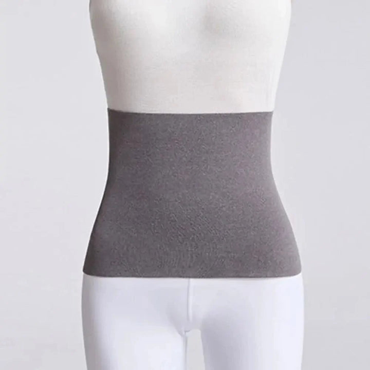 Fascia lombare elastica unisex con scaldareni, piegata. Pronta per offrire supporto schiena, calore e benessere.