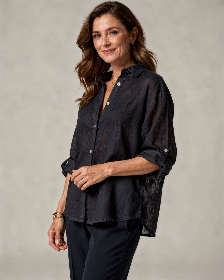 Elegante camicetta donna oversize a maniche lunghe, ideale per la stagione primavera estate.