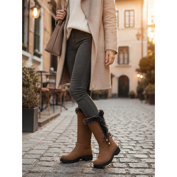 Stivali invernali eleganti donna, con pelliccia sintetica interna e suola in gomma antiscivolo.