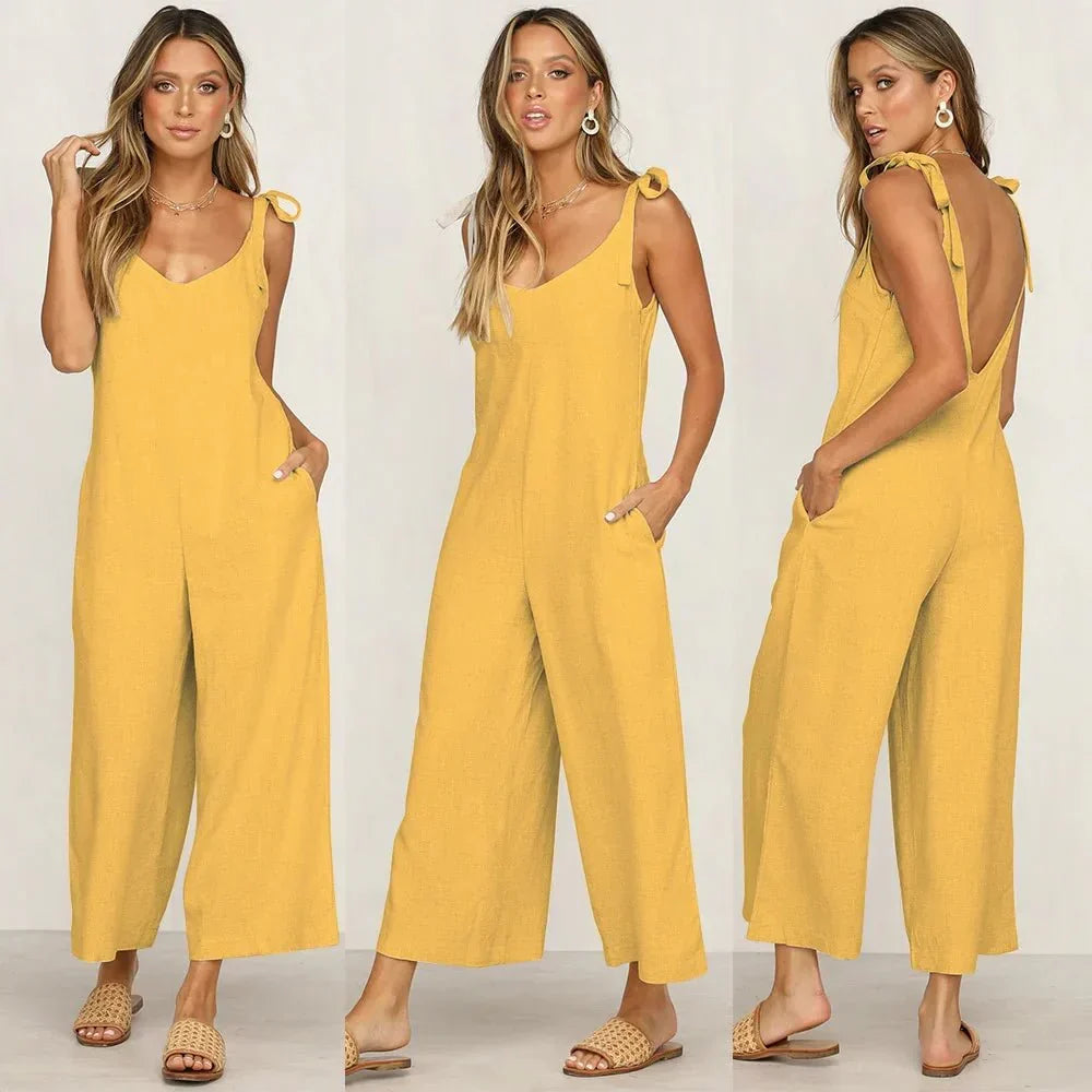 Tuta donna estiva midi, scollo a V, senza maniche. Ideale per un look chic e abbigliamento casual elegante.