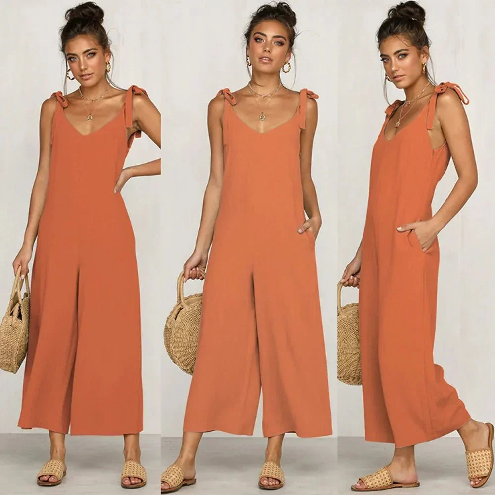 Tuta dritta midi da donna arancione, stile chic senza maniche e scollo a V. Moda estiva versatile.