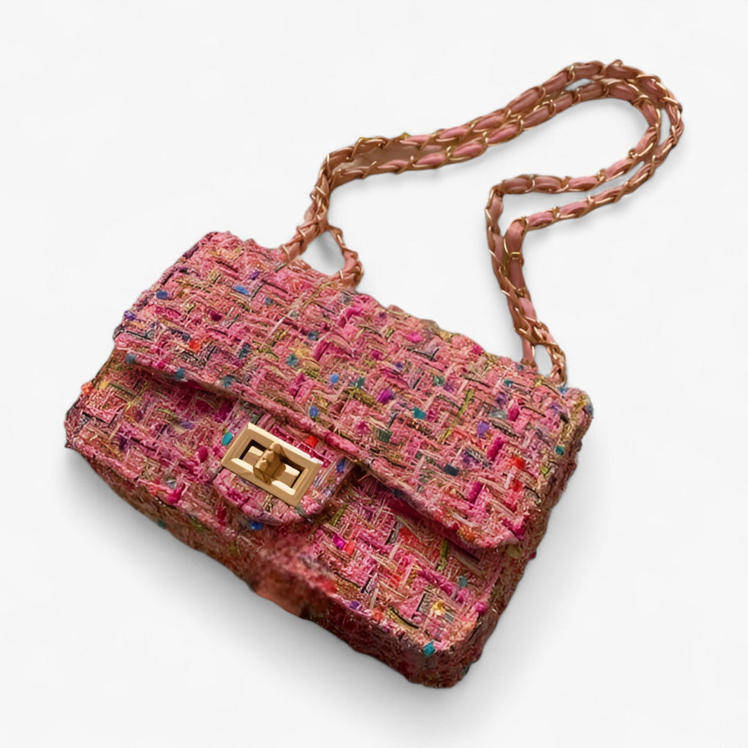 Borsa a tracolla donna in tweed multicolore, motivo floreale vivace, accessorio moda elegante e casual.