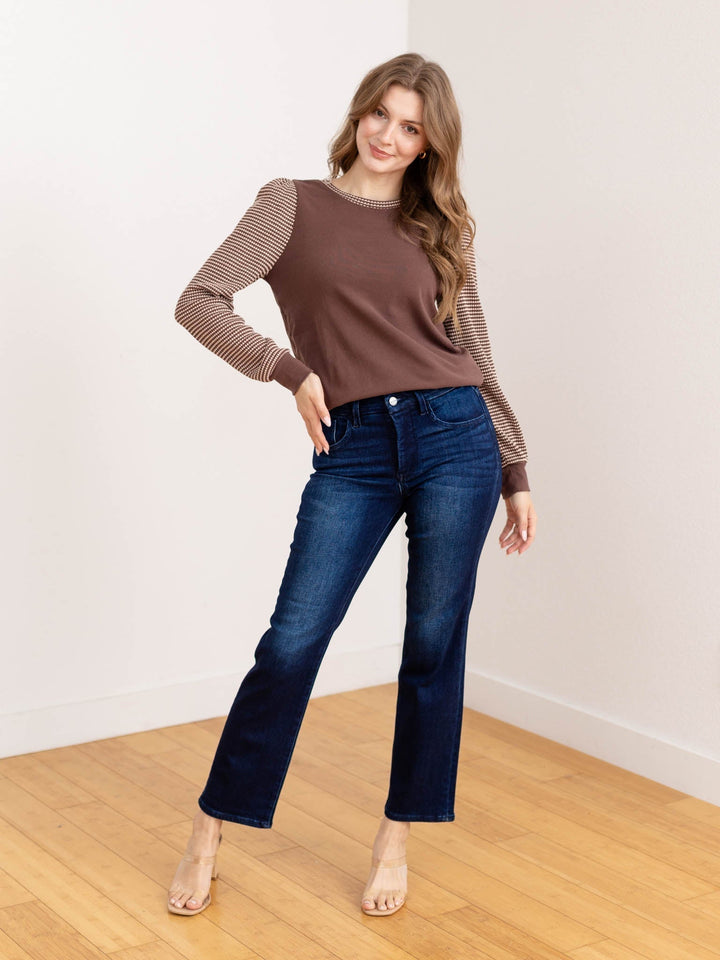 Maglia elegante da donna, maniche a palloncino e scollo tondo. Ideale per un look quotidiano comodo e alla moda.
