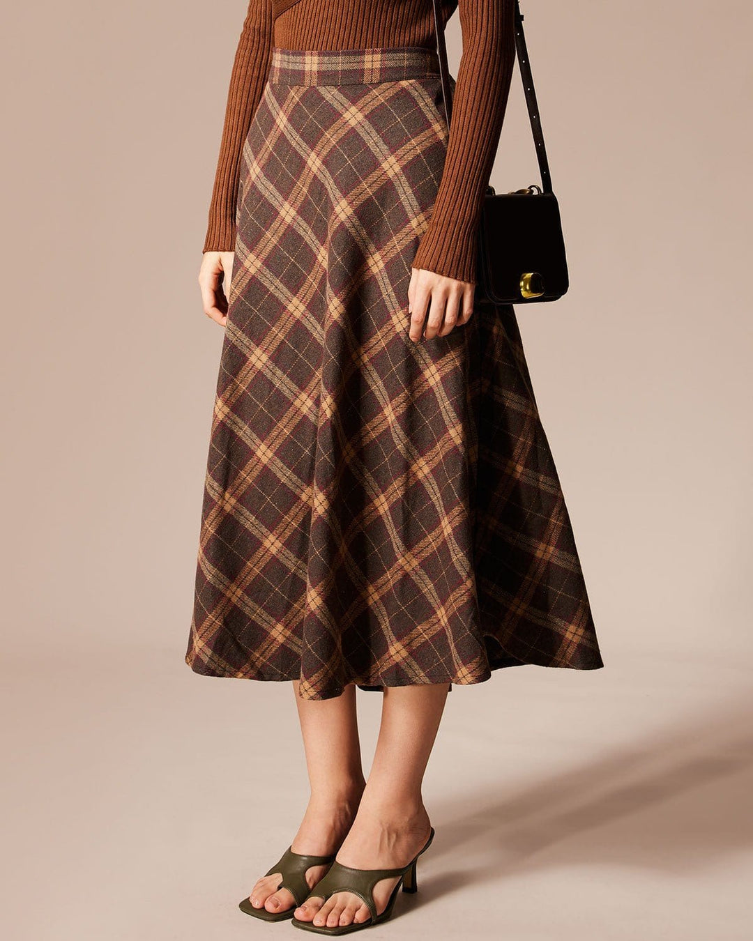 Gonna A-line midi donna a quadri, vita alta con elastico. Un capo versatile per outfit casual chic e comodi.