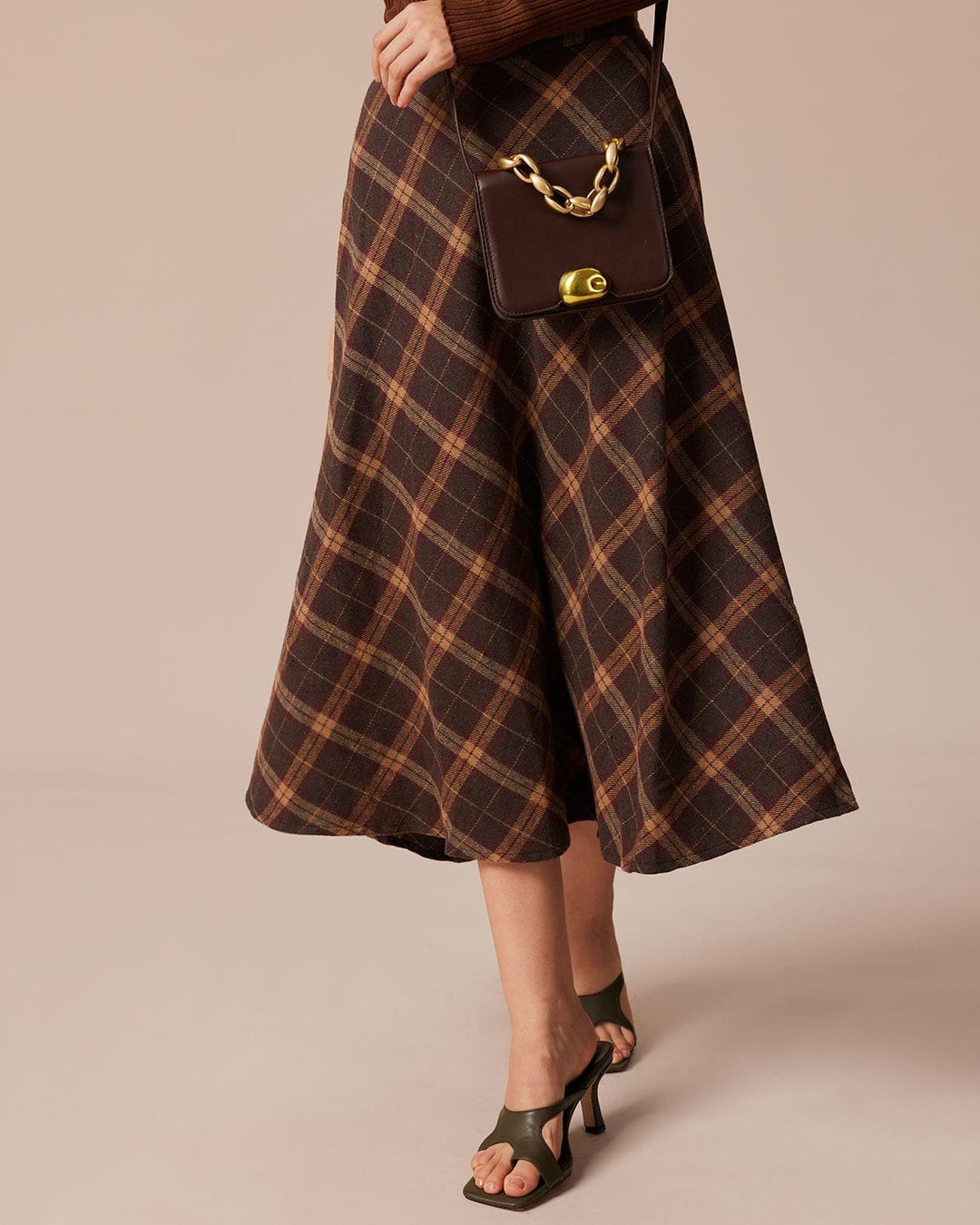 Gonna midi donna a quadri A-line con vita alta elastica. Ideale per un look elegante o casual primaverile.