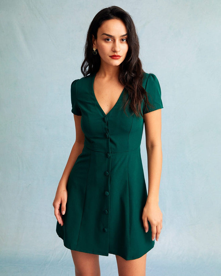 Elegante abito mini donna verde scuro, scollo V, manica corta, linea ad A. Perfetto per eventi casual o serate.
