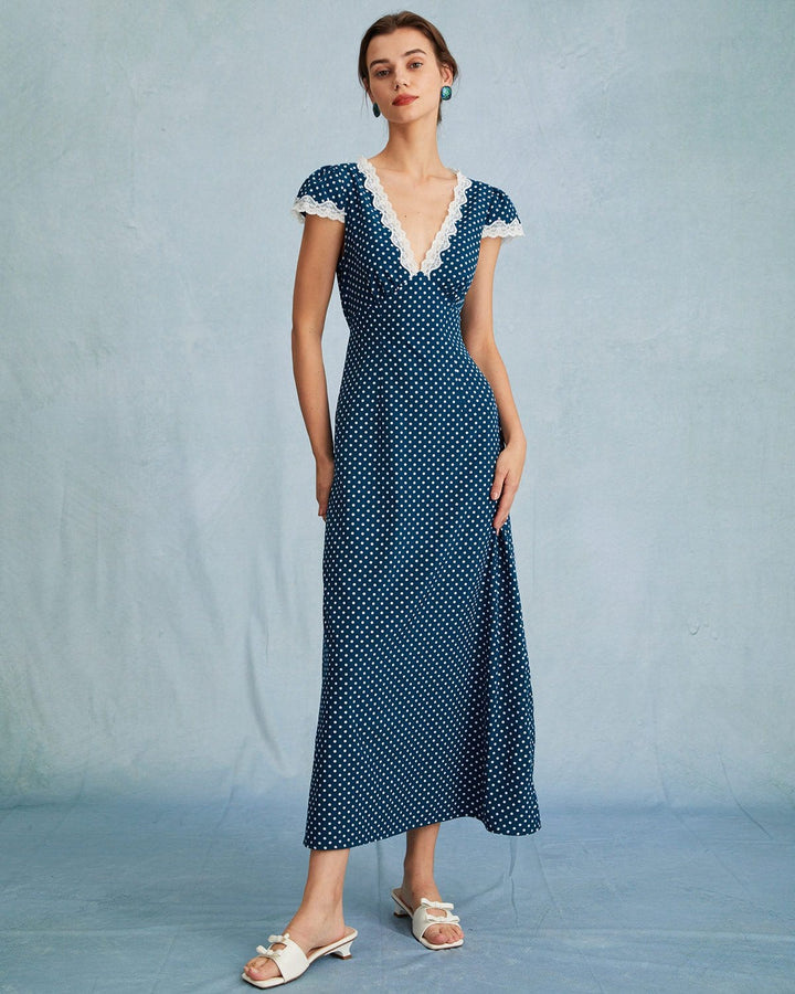 Abito maxi donna blu navy con profondo scollo a V e motivo a pois bianchi, vestito elegante serale.