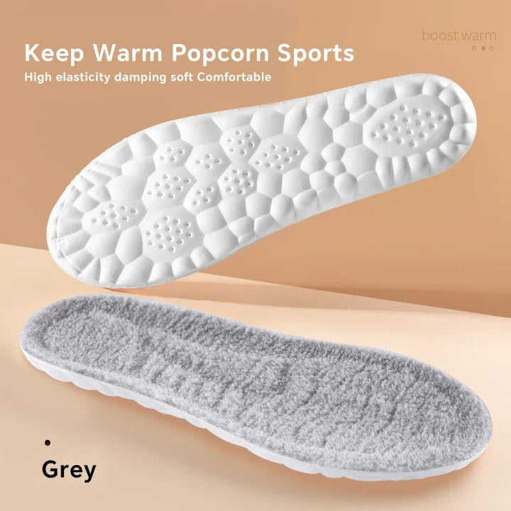 Solette riscaldate ergonomiche per scarpe, con supporto arco plantare, offrono sollievo e calore costante invernale.