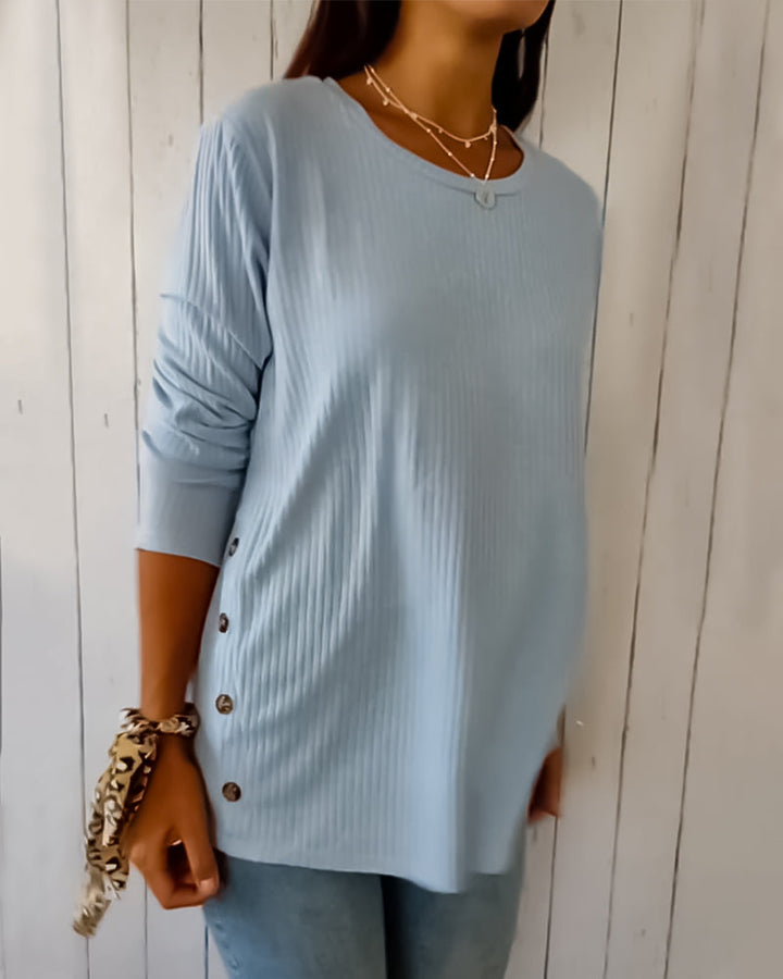 Maglia grigia girocollo da donna, maniche lunghe. Versatile per abbigliamento quotidiano, stile casual primaverile.