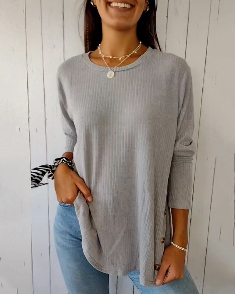 Maglia donna casual a maniche lunghe e girocollo, perfetta per il comfort quotidiano. Disponibile in blu, grigio, rosa.
