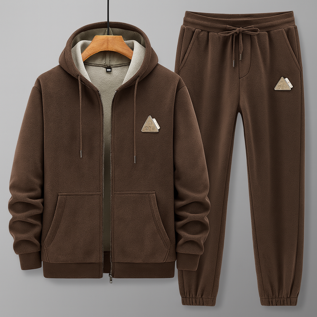 Tuta da uomo jogger bicolore con cappuccio e polsini elasticizzati. Completo sportivo casual per massimo comfort e stile.