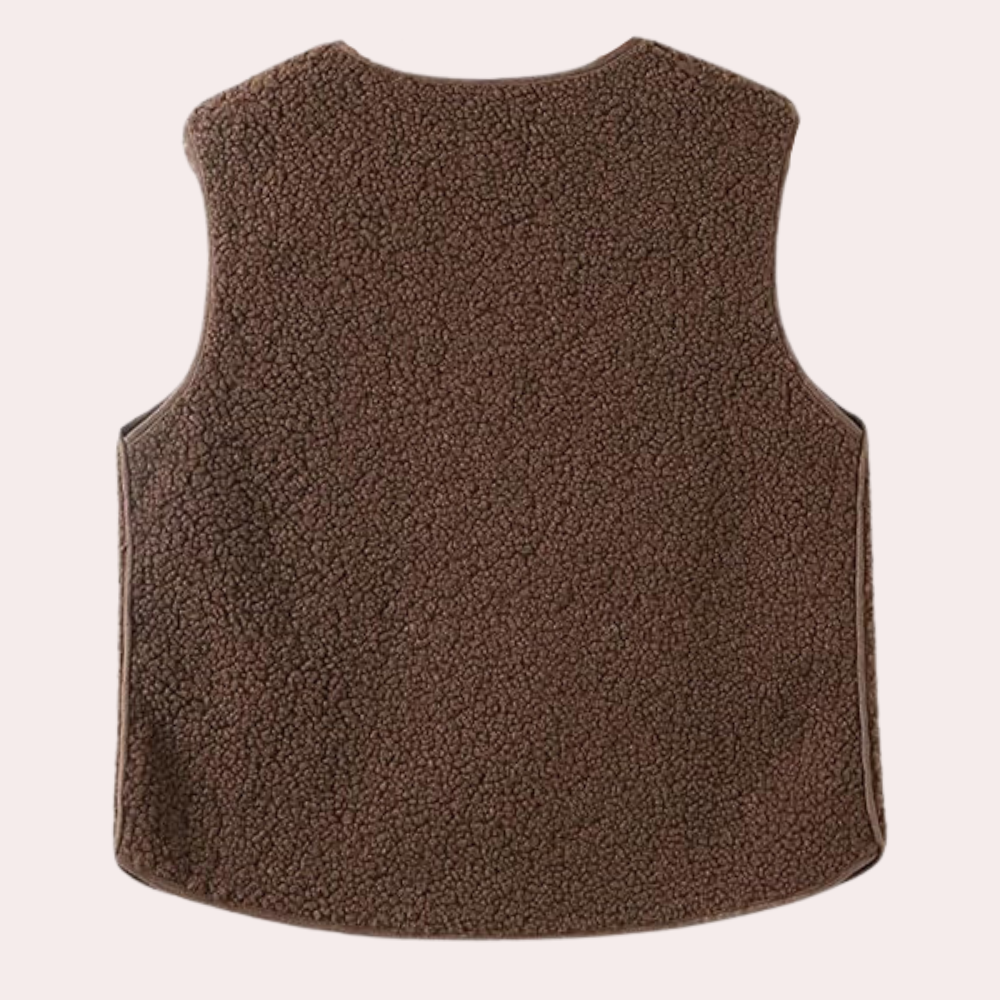 Caldo gilet da donna in sherpa beige con bottoni, ideale per la moda invernale e la stratificazione.