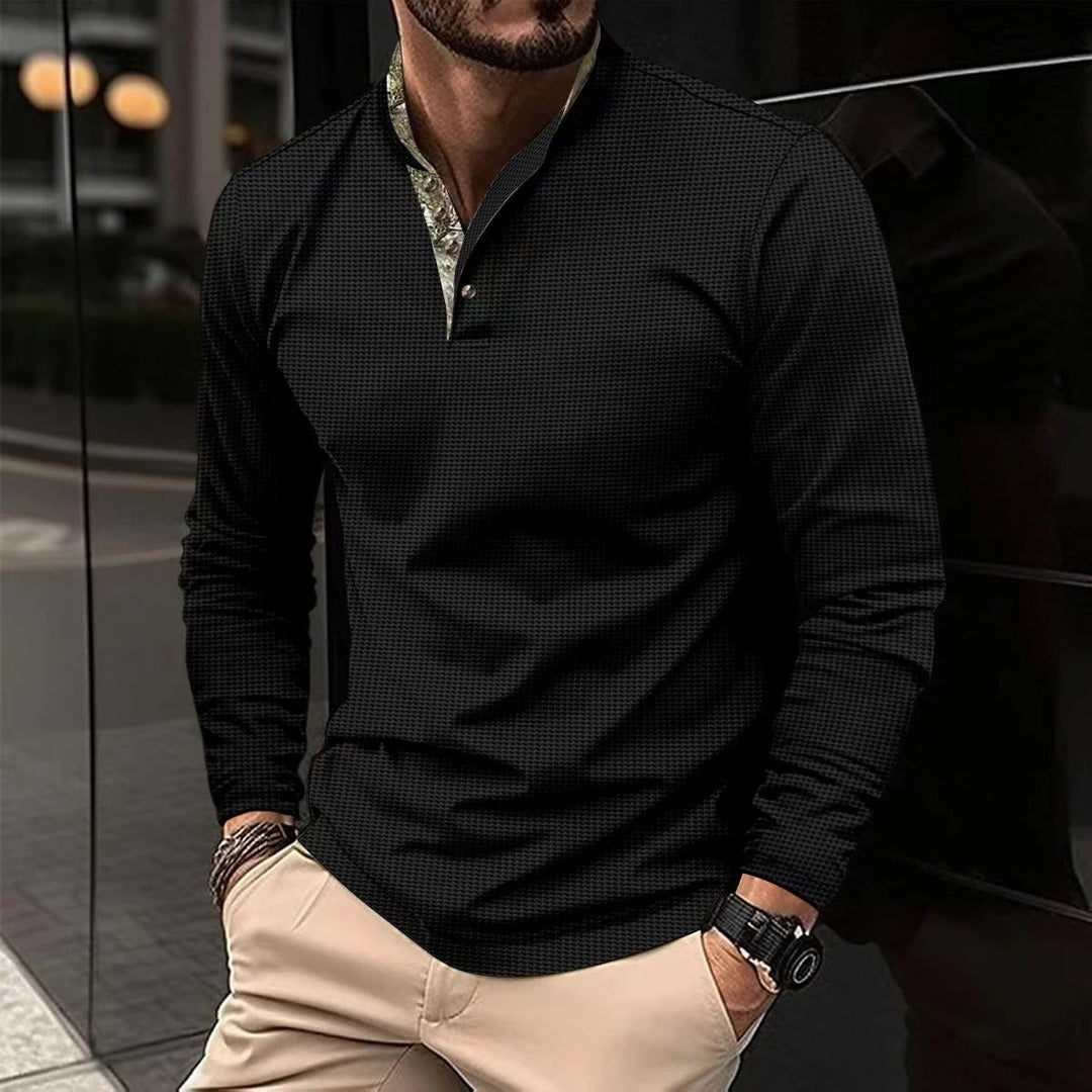 Polo a maniche lunghe con collo moderno per uomo, ideale per un look versatile e un'eleganza senza tempo.