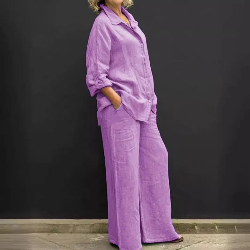 Completo rosa cipria con camicia oversize e pantaloni larghi. Perfetto per stile rilassato e tempo libero.