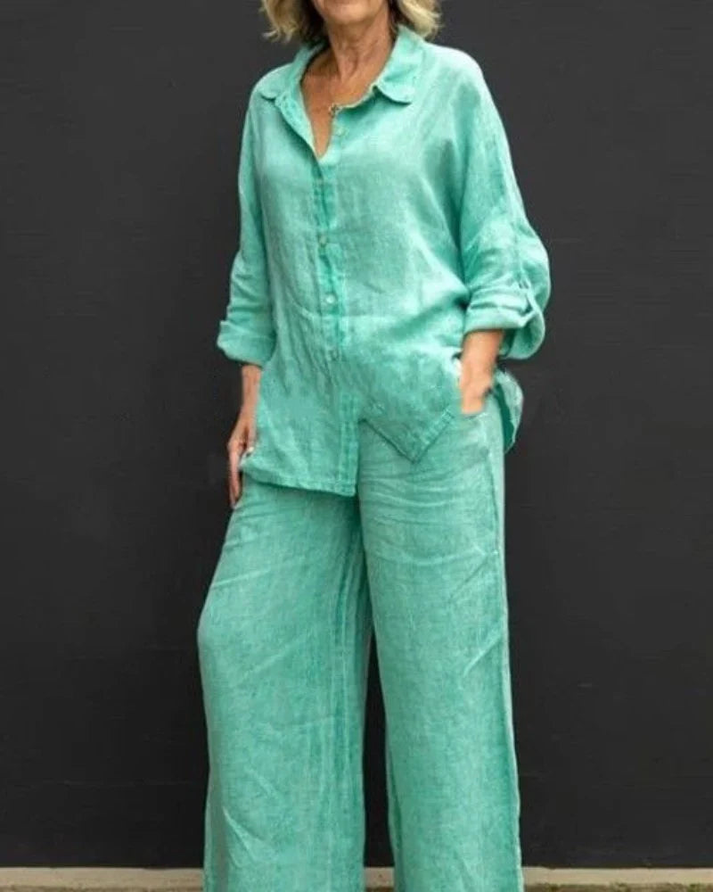 Completo donna verde smeraldo con camicia e pantaloni ampi, ideale per tempo libero e viaggio.