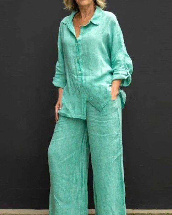 Completo donna verde smeraldo con camicia e pantaloni ampi, ideale per tempo libero e viaggio.